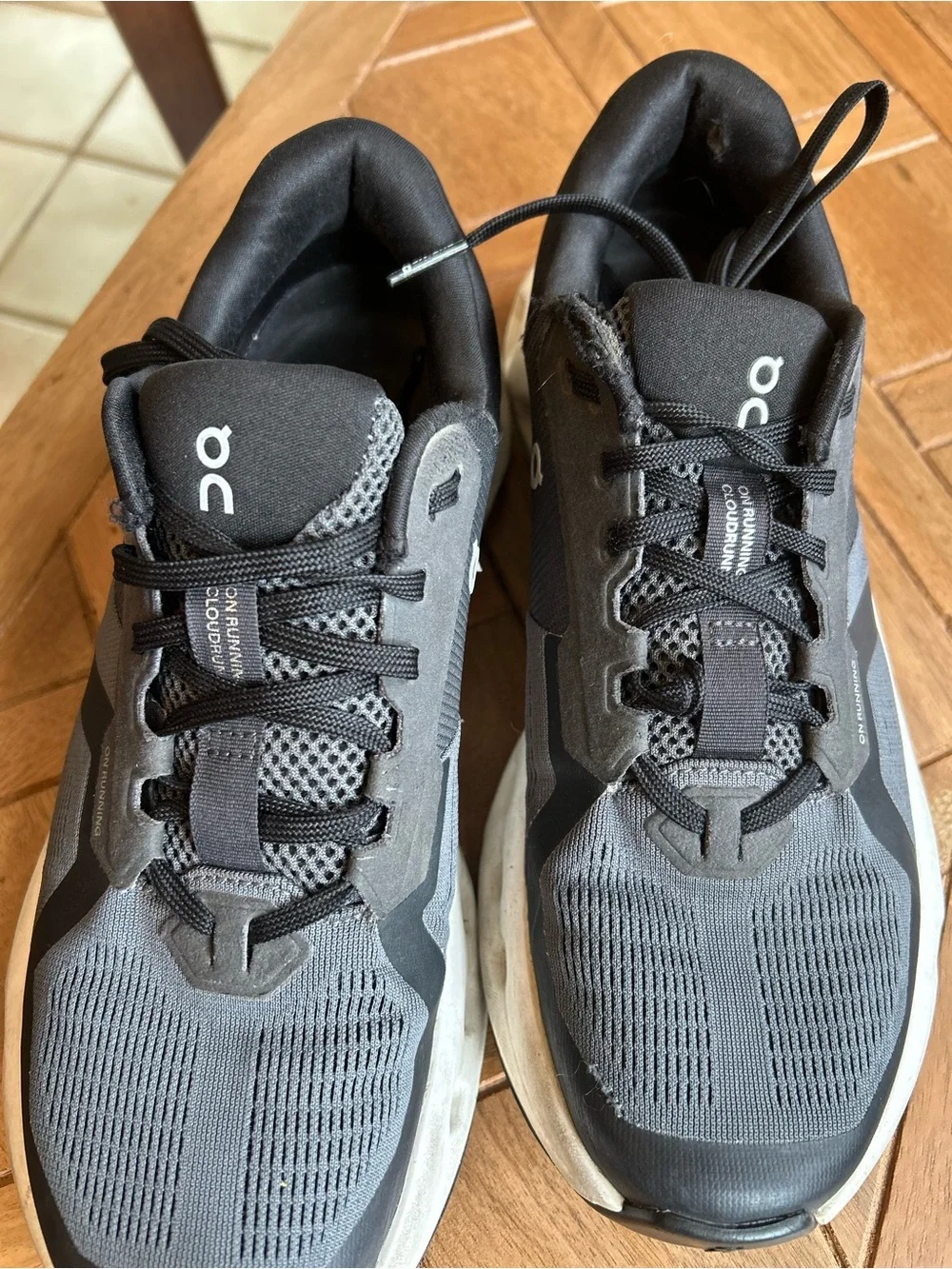 On Running Cloudrunner 2 Women’s Sneakers — Black and White